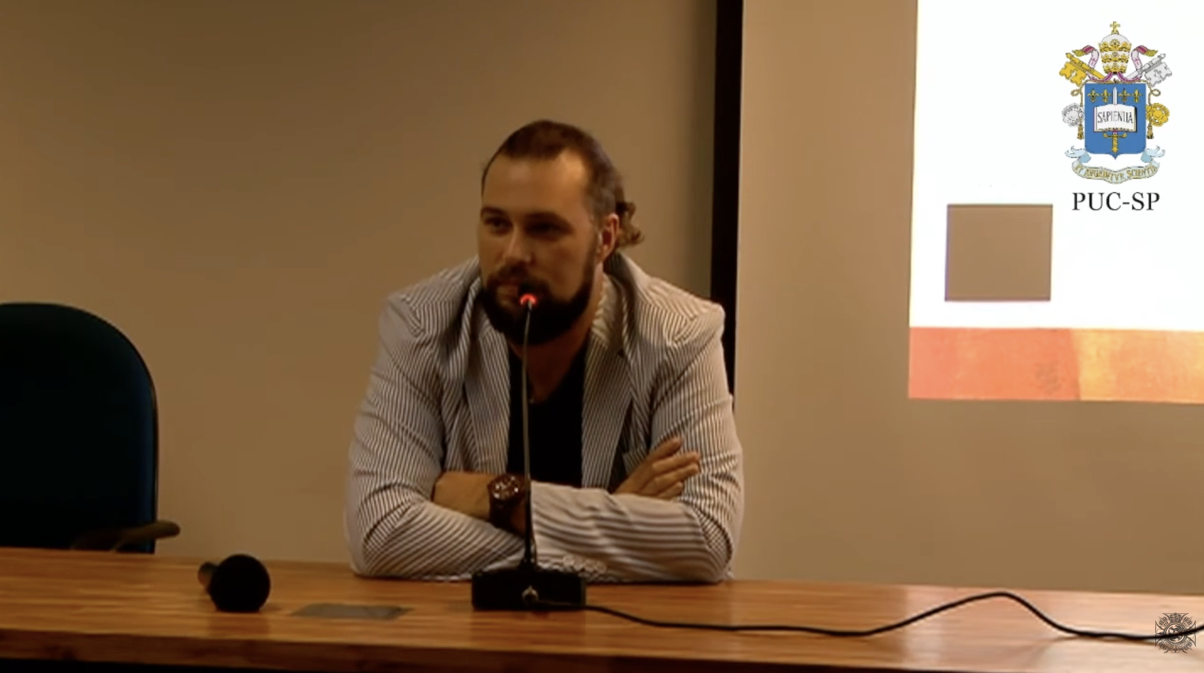 Eduardo Casarotto giving a lecture at PUC-SP
